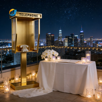 Cabine téléphonique pour événements avec livre d'or audio, idéale pour mariages, fêtes et décoration de toile de fond