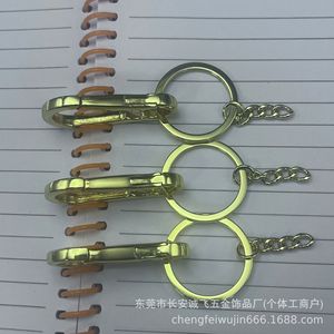 Porte-clés en acier inoxydable, porte-clés de voiture rond en alliage de zinc plaqué, boucle de ceinture unisexe, anti-perte, vente directe d'usine - Product Image 1