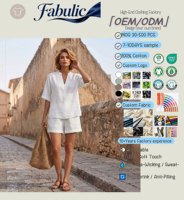 Fabricant OEM de tenues deux pièces personnalisées pour femmes, haut à col en V à manches courtes et short ajouré, tenue décontractée d'été, vente en gros