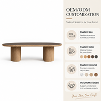 Table basse ovale avec plateau en marbre, bord en bois, base en piédestal cannelé pour salon