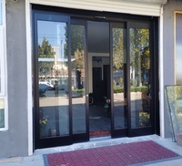 Porte automatique en alliage d'aluminium avec verre, porte d'évacuation d'urgence pour entrée de gare