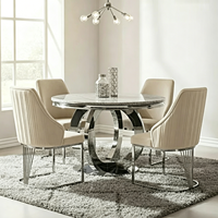 Table à manger élégante en acier inoxydable de luxe léger, moderne et minimaliste, en marbre, imperméable et durable, pour hôtel et usage domestique.