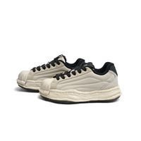 Chaussures de skate décontractées unisexes de qualité supérieure, fabriquées en Chine, avec embout en coque, semelle fondue, tige en cuir véritable, imperméables et respirantes
