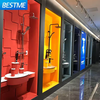 Ensemble de douche cascade gris anthracite avec jet massant, barre coulissante murale, installation apparente moderne, pommeau de douche haute pression pour salle de bain