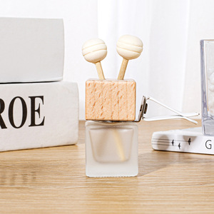 ขวดน้ำหอมปรับอากาศในรถยนต์แบบหนีบช่องแอร์ ขนาด 8 มล. สีสันสดใส พร้อมฝาไม้ ขายส่ง - Product Image 6