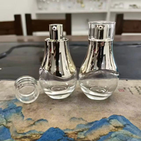 Botol Pompa Lotion Kaca Bening 30ml Bentuk Persegi Oval Harga Pabrik, Botol Perawatan Kulit Kosong Portabel untuk Perjalanan dengan Tutup Persegi Multi Warna