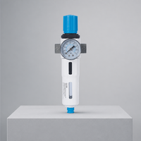 Filtre régulateur de traitement d'air série FR à corps cylindrique blanc avec manomètre, jauge de niveau et vanne de vidange modulaire facile
