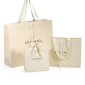 Logo dập nổi thiết kế miễn phí túi quà tặng sang trọng có tay cầm túi kraft tùy chỉnh Túi giấy Kraft Trung Quốc - Product Image 1