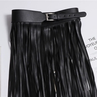 Jupe en similicuir PU pour femme, ceinture noire, style urbain, décorations à franges, nouvelle mode