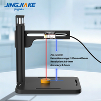 Machine de marquage laser à axe Z avec système de contrôle automatique de la hauteur et capteur de mesure de distance pour un ajustement précis de la mise au point