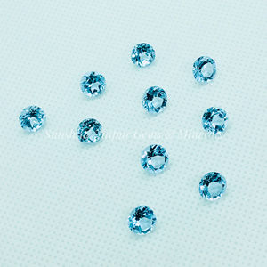 พลอยโทแพซธรรมชาติทรงกลมเจียระไนแบบบริลเลียนท์ ขนาด 5 มม. ต่อชิ้น ราคาส่งจากโรงงาน คุณภาพสูง เจียระไนเหลี่ยม หลวม สีฟ้าอ่อน IGI - Product Image 2