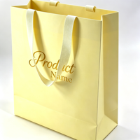Vente en gros d'usine, sacs en papier kraft personnalisés de luxe, sacs cadeaux artisanaux jaunes, sacs de shopping imprimés avec logo