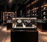 Vitrine de présentation noire et or pour boutique de montres et de bijoux haut de gamme, vitrine en verre pour montres de luxe
