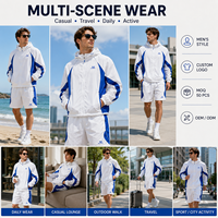 Conjunto Deportivo de Dos Piezas para Hombre: Chaqueta Ligera con Capucha y Cremallera Completa en Bloques de Color y Pantalones Cortos con Rayas Gruesas y Mangas Raglán