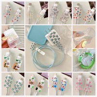 Funda de cargador de TPU suave con flores de dibujos animados 5 en 1 para iPhone 16 15 14 18W 20W, funda protectora para Cable con mordida