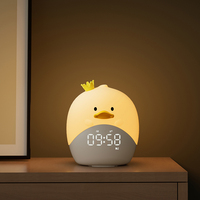 Vente en gros de lampes de nuit en silicone mignonnes avec réveil numérique pour enfants