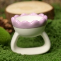 Masseur facial en céramique de style anneau central jaune, outil de massage Guasha pour le visage