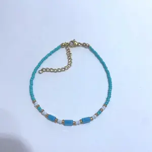 Vente en gros directe de perles de rocaille en verre plaqué or 18 carats de la rougeole bracelets de perles de cristal en acier inoxydable bracelet de cheville fermoir mousqueton