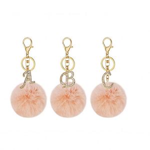 Llavero DIY de 26 letras inglesas con diamantes brillantes, bola de pelo de conejo, llavero de felpa con cristal, llavero de metal para bolso, regalo de joyería al por mayor - Product Image 3