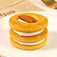 Nouveau produit 2026 : Biscuits et gâteaux ronds saveur amande, emballés individuellement (11,6 g), fourrés au nougat – Délicieuse collation