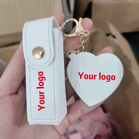 Haute qualité en gros brillant à lèvres mignon voyage Portable pochette de maquillage avec porte-clés miroir marque privée Pu cuir lèvre huile brillante