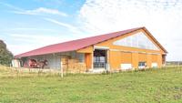 Structure en acier préfabriquée grange à chevaux entrepôt d'atelier bâtiment en métal durable pour la ferme et le ranch