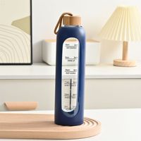 Botella de agua de vidrio ecológica de 1000 ml de gran capacidad con cuerda para transportar, botella de agua de vidrio para viajes y uso en exteriores con funda de silicona.