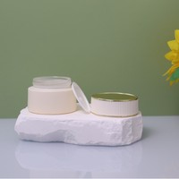 Flacon de crème de soin transparent haut de gamme en forme de montagne enneigée 30g, emballage cosmétique en verre, impression UV, fourni par l'usine