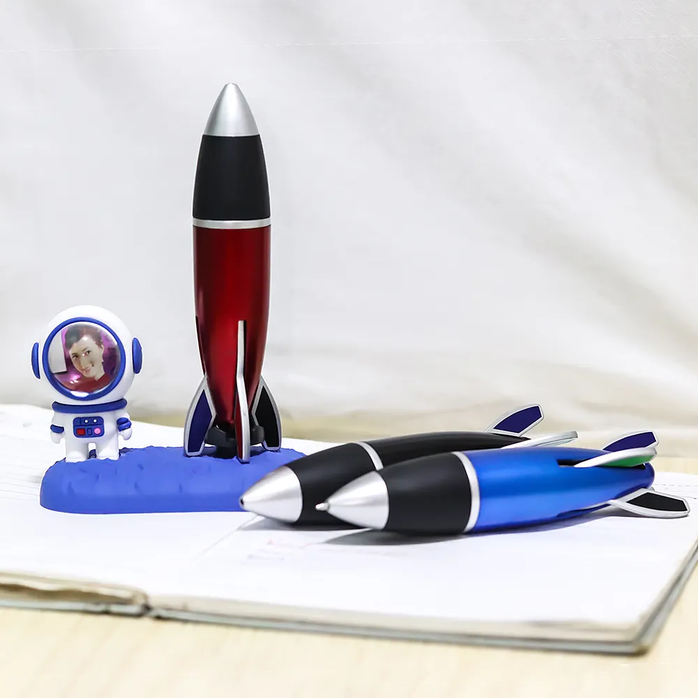 NEW 3D Astronaut Desk Decoration Gift with Spaceship Rocket 4 Color Pen, Silicone Car Interior Ornament with Multicolor pens