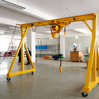 Grue portique mobile de 1 à 15 tonnes avec palan électrique à chaîne, dotée d'un moteur et de composants d'engrenage essentiels