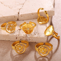 Bague ouverte pour femme en acier inoxydable plaqué or avec décoration en strass en forme de trèfle à quatre feuilles