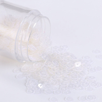Paquet de 10g de paillettes rondes en PVC irisées mates de 2 à 6 mm, transparentes et givrées