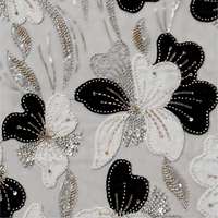 Dentelle brodée 3D florale de luxe avec des paillettes perlées en blanc et noir, 100% polyester, pour robes de soirée