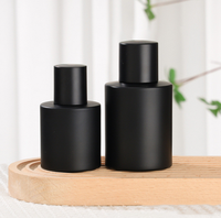 Flacon de parfum en verre noir mat de haute qualité d'usine, 30 à 50 ml, cylindre, pompe pulvérisateur, brume fine, fond épais, pour cosmétiques