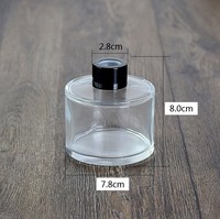 Bouteille diffuseur de parfum en verre noir mat rond de luxe vide en gros 50ml 100ml 200ml