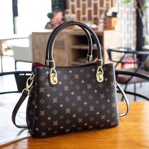 Designer de luxe femmes décontracté fourre-tout sac à main en cuir véritable fermeture à glissière motif à rayures étanche bandoulière sac de voyage - Product Image 1