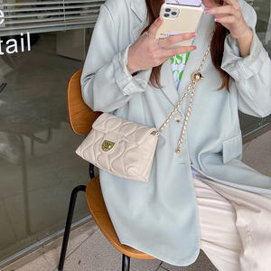 White Quilted Mini Shoulder Bag With Chain Strap 7 Inch Solid Color <b>Lock</b> Closure Women's Crossbody Bag - Product Image 2