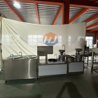 Tofu commercial industriel faisant la machine Machine de fabrication de lait caillé de soja Composants de noyau de PLC de machine de pouding de soja Garantie de 1 an