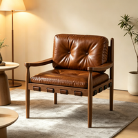 Fauteuil individuel Tenghang en bois massif de style mi-siècle, fauteuil lounge design en cuir huilé pour salon et bureau