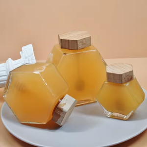 Venta al por mayor 280g 380g Frasco de miel con tapas de madera Cuchara - Product Image 1