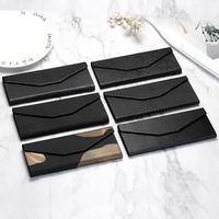 Étui à lunettes triangulaire pliable haut de gamme JSJM – Boîte d'emballage portable et anti-stress pour lunettes de soleil – Vente en gros