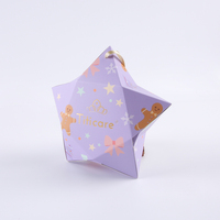 Nouveauté 2026 Boîte cadeau de Noël en papier en forme d'étoile en carton décoratif créatif avec ruban pour bonbons