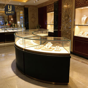 Vitrina de Joyería de Vidrio Curvo con Diseño de Arco Sin Costuras que Crea un Centro de Atención Fluido y Moderno para Boutiques de Lujo - Product Image 4