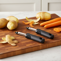 Multifunctionele roestvrijstalen draaibare groenteschiller, -snijder en -hakker met zachte PP-handgreep, handmatig fruit- en groentegereedschap