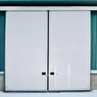 Porte coulissante électrique industrielle avec commande manuelle, panneau sandwich en mousse PU pour entrepôt et atelier