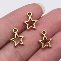Colgante de Estrella Hueca de 10x13mm en Aleación de Zinc Tono Plata para Etiquetas de Recuerdo de Baby Shower