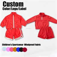 Ensemble deux pièces coupe-vent personnalisé pour enfants : veste courte à col montant et manches longues, et short de sport – Tenue décontractée pour enfants OEM