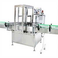 Machine de remplissage automatique pneumatique haute performance pour aérosols cosmétiques, peintures, parfums et sprays corporels, avec capacité de 1 pouce de diamètre.