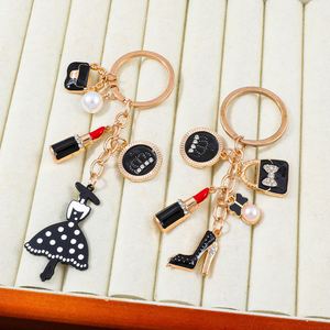 Porte-clés en métal coloré pour femme, style petite fragrance, avec pendentif nœud et rouge à lèvres rouge, motif amour - Product Image 2