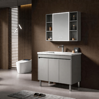 Meuble-lavabo mural pour salle de bain avec pieds métalliques surélevés, support robuste, design flottant, nettoyage facile, armoire avec miroir et rangement